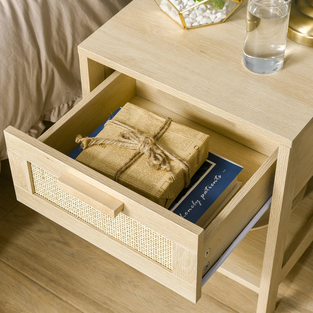 Natural rustic bedside table set showing rattan drawer front and open storage space