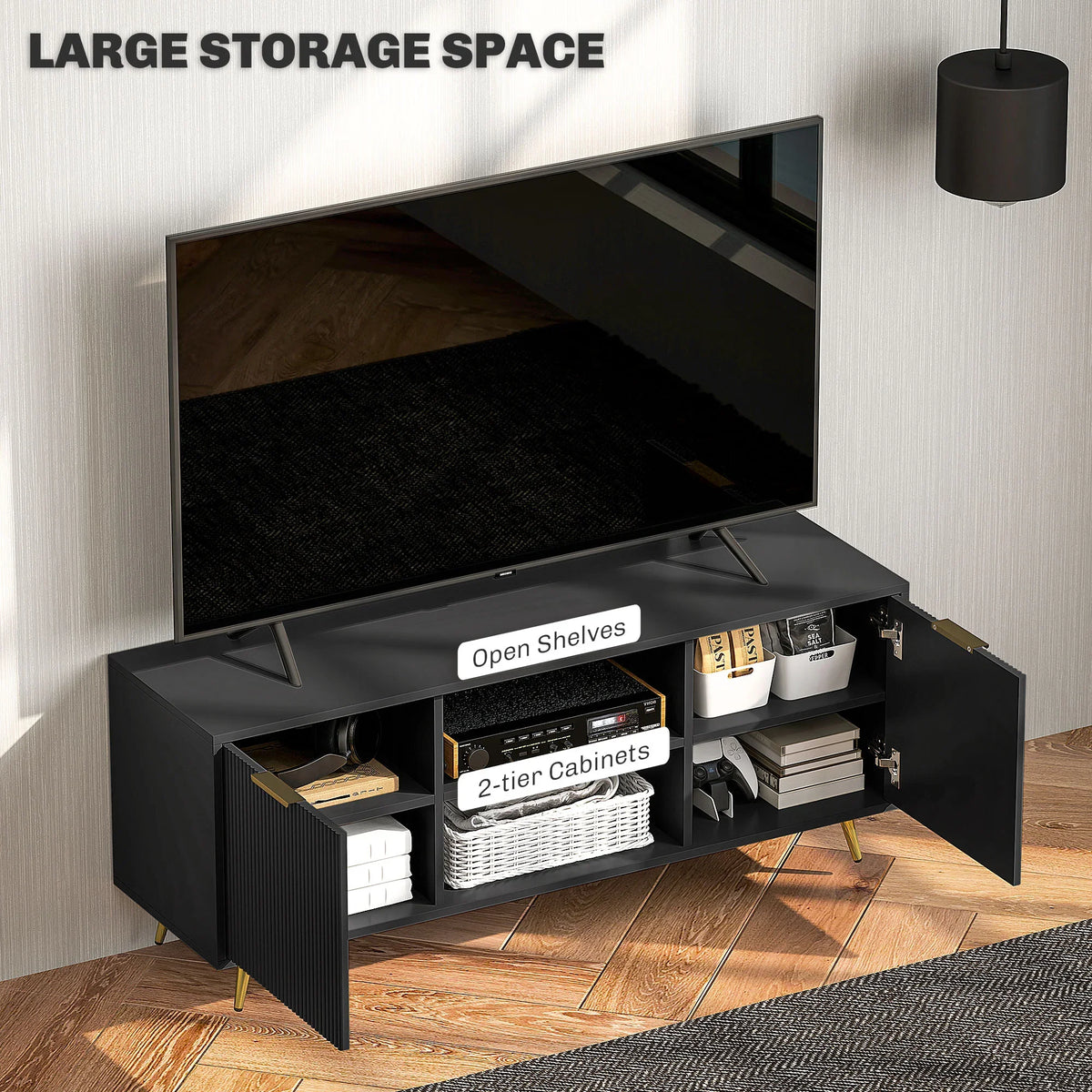 Black TV stand with open top shelf and side cabinets for media storage