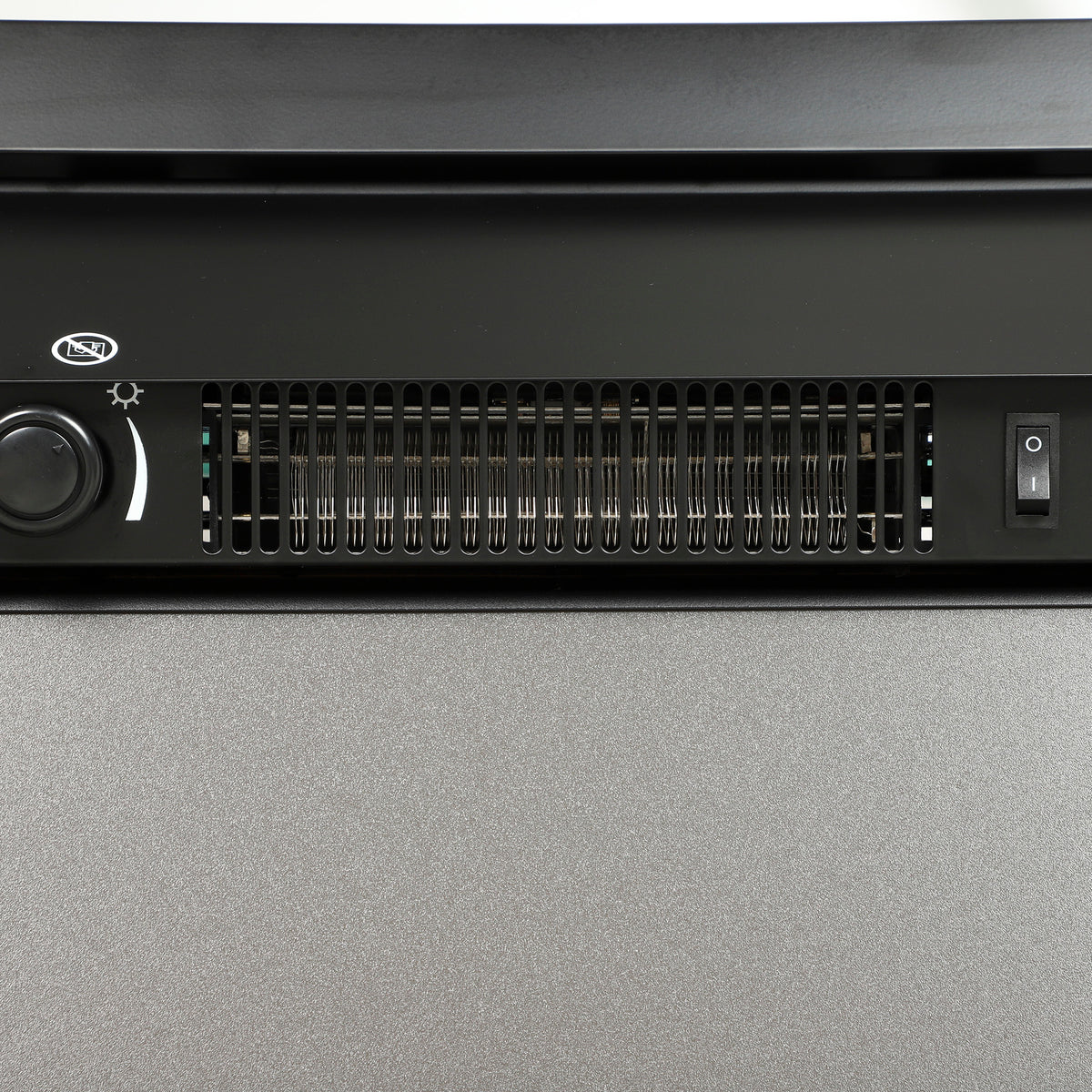Electric fireplace stove vent grille with power switch and control dial on the front panel