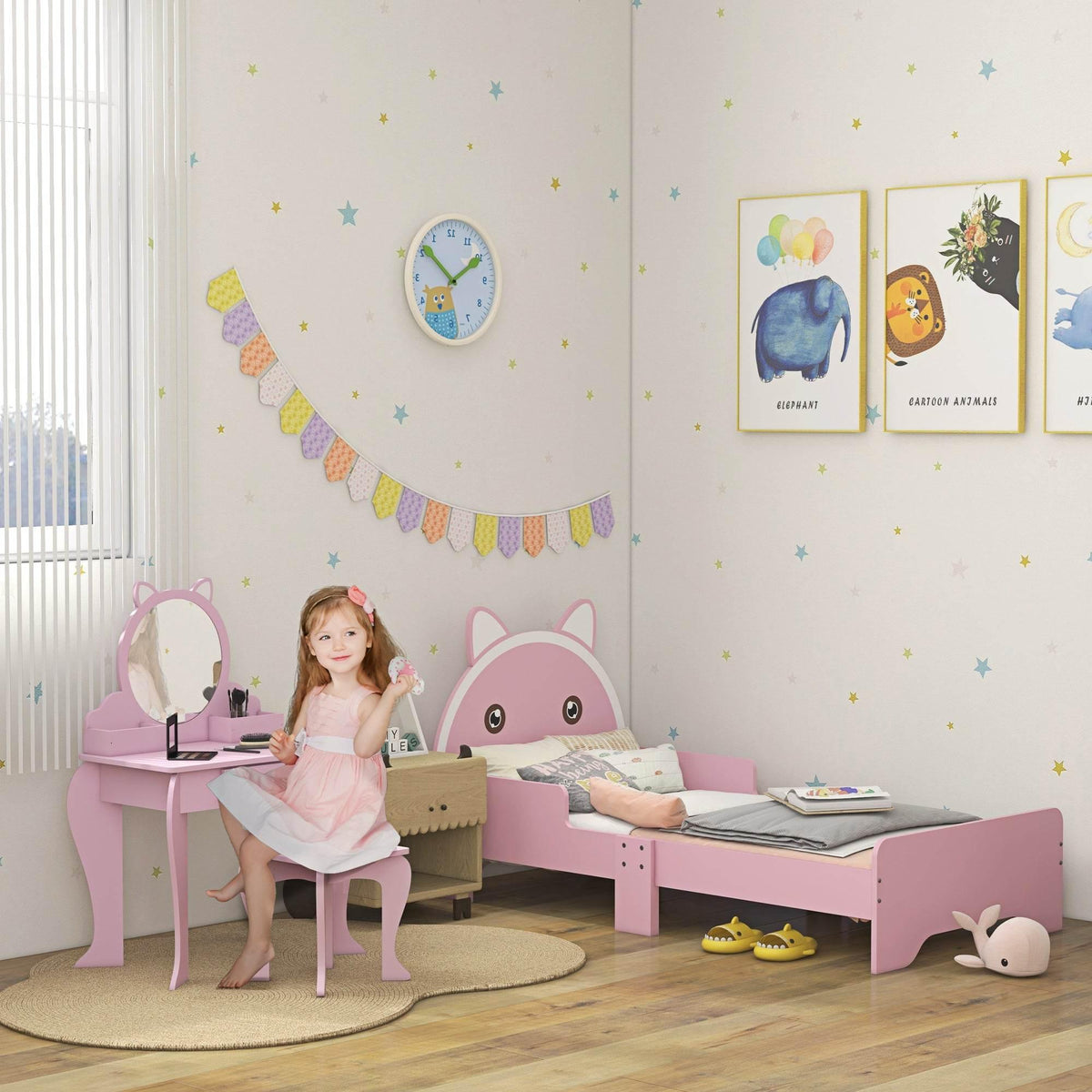 Cat-themed wooden kids bed with pink animal headboard and side guardrails