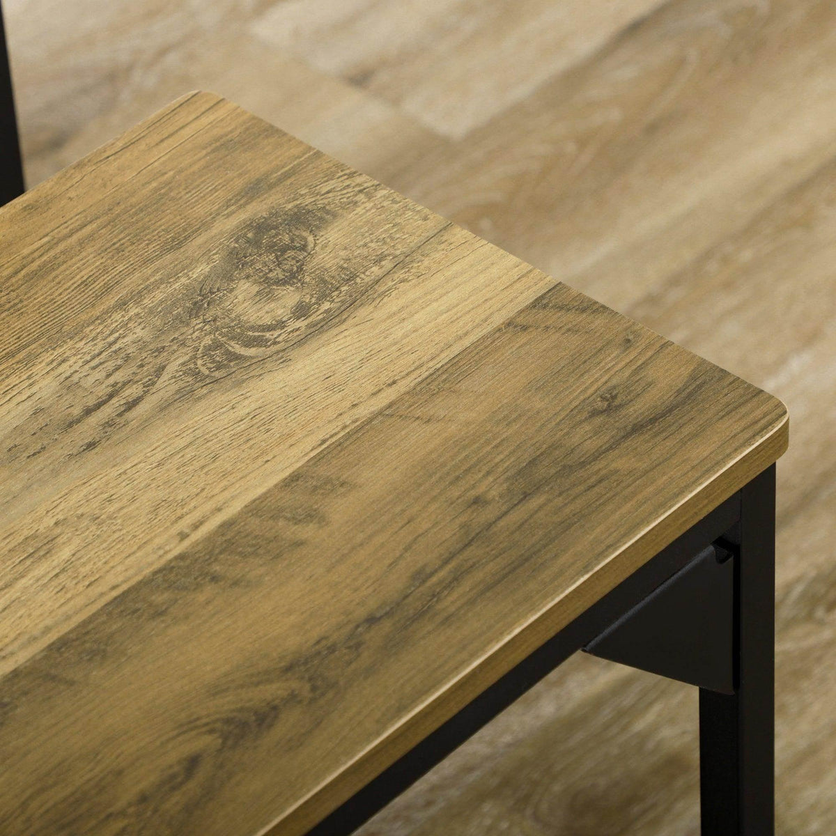 Wood-look bench tabletop with dark metal frame and sturdy corner supports