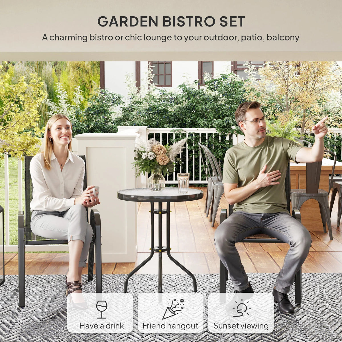 Garden bistro set with round glass-top table and two dark stackable mesh chairs