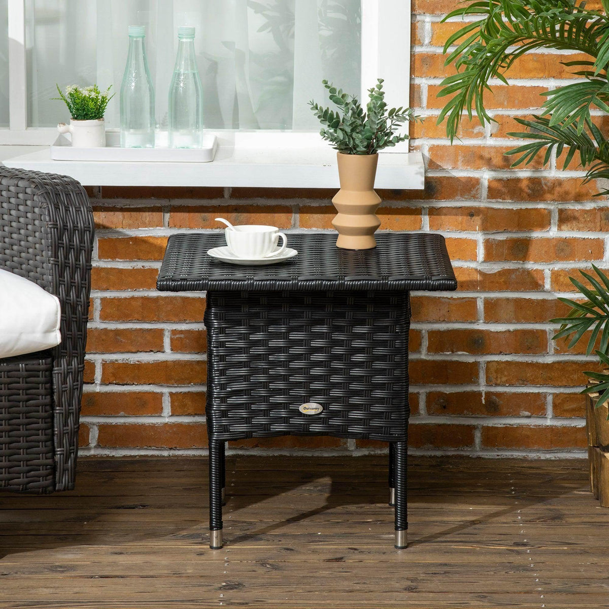 Black PE rattan outdoor side table with drawer and woven top