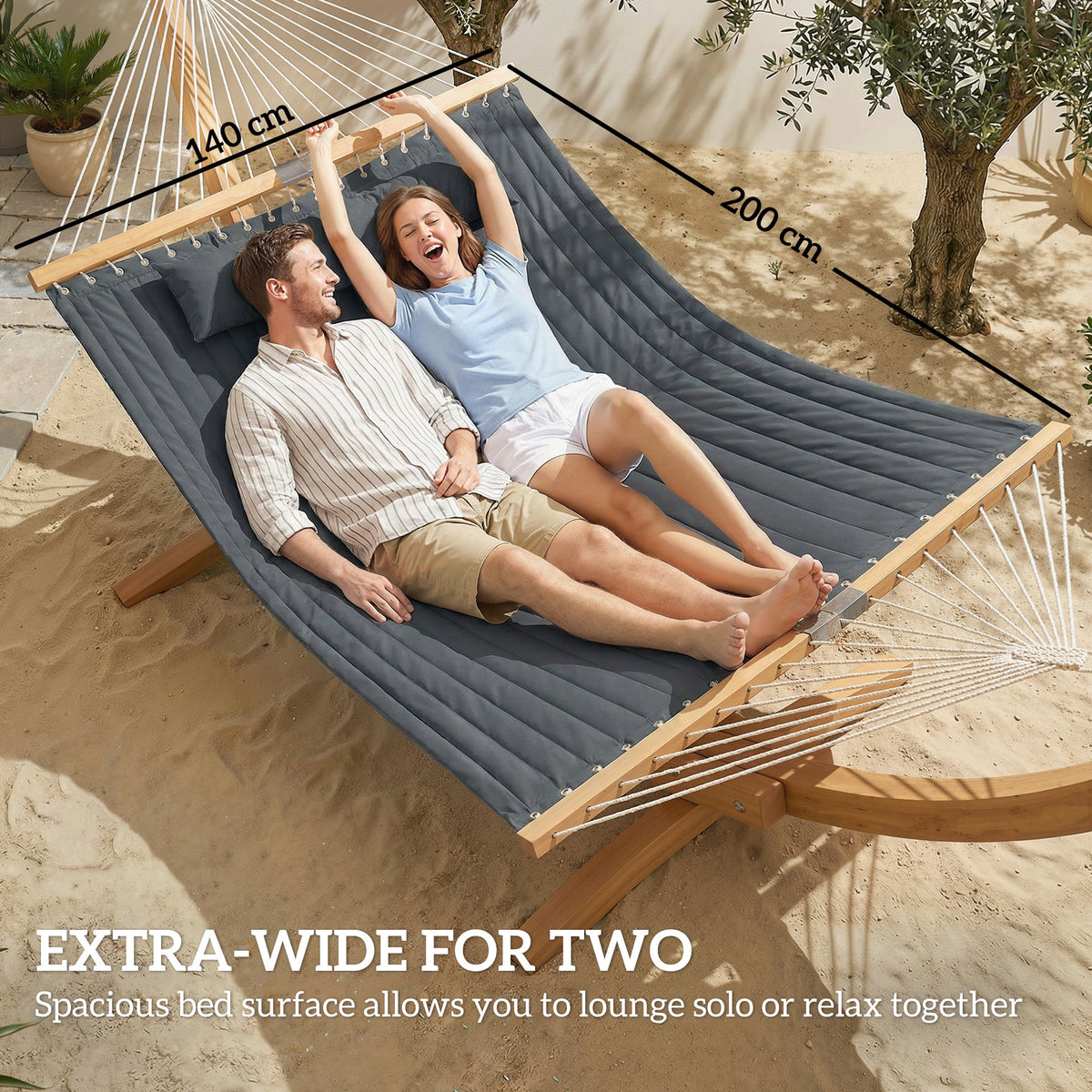 Grey double hammock swing bed with pillows, padded center and spreader bars