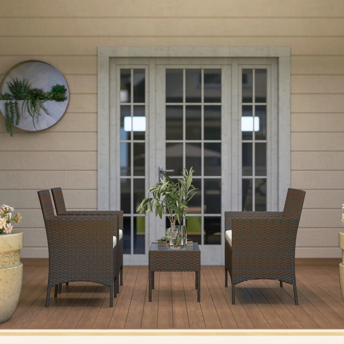 Brown woven rattan patio furniture set with armchairs, loveseat, and small glass-topped table