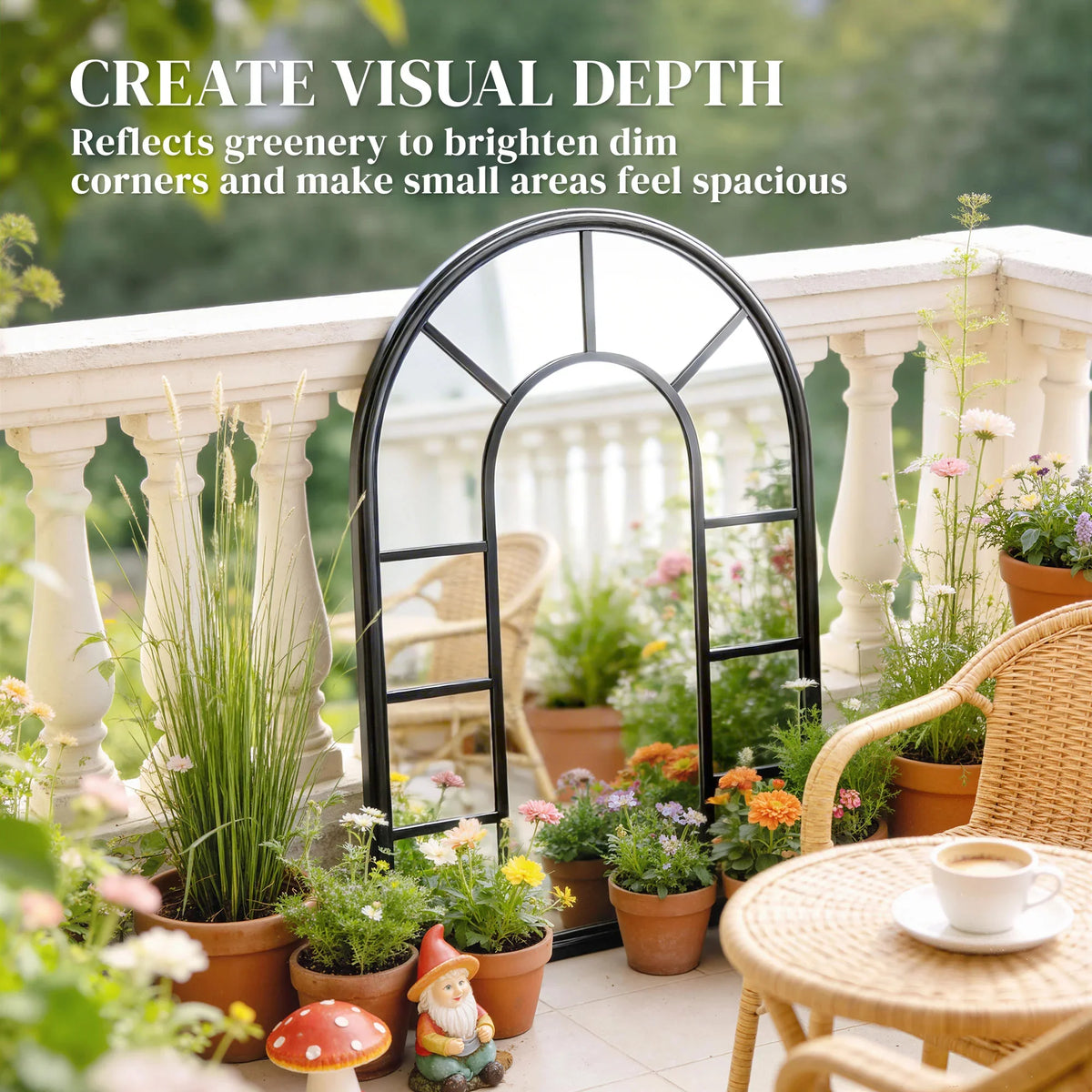 Black arched windowpane wall mirror creating visual depth in a flower patio setting