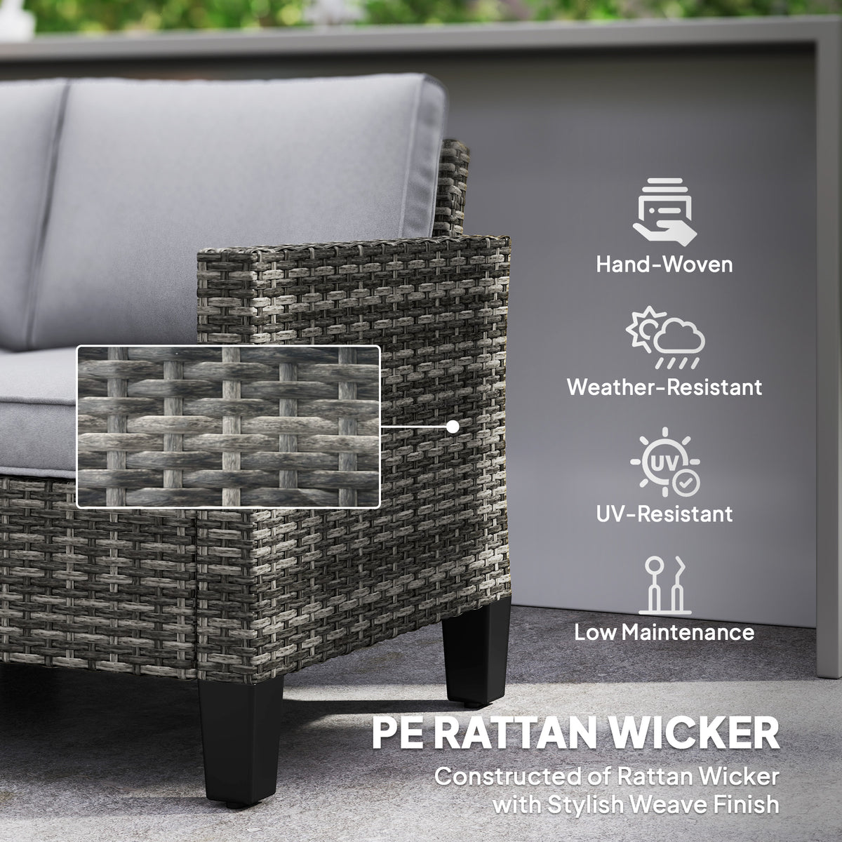 Dark grey hand-woven rattan outdoor sofa with thick grey cushions