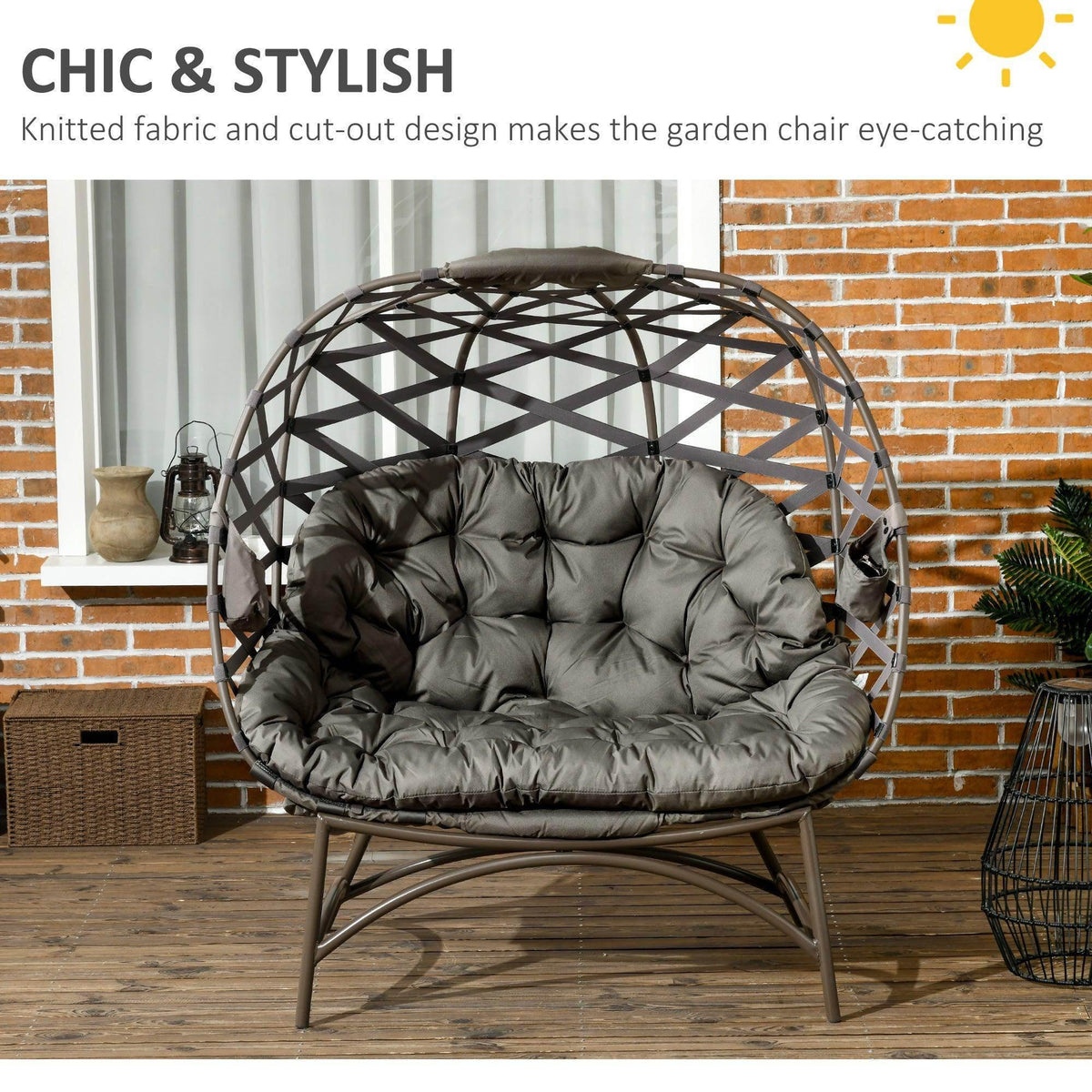 2-seat egg chair with dark woven basket design and tufted gray cushion