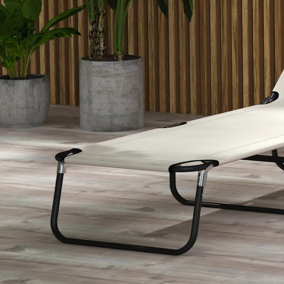 Cream adjustable sun lounger with black steel base and curved support legs