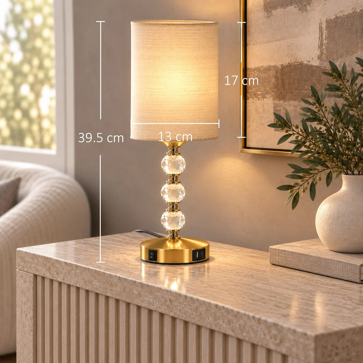 Crystal bedside table lamp with beige fabric shade and gold base with size markings