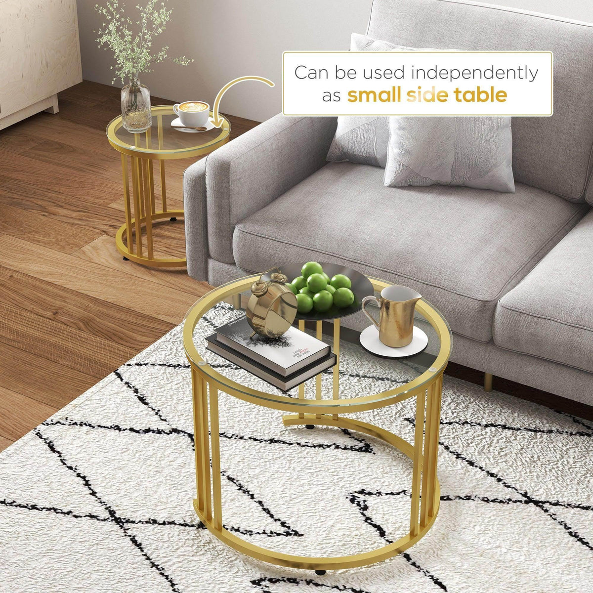 Gold round coffee table with tempered glass top and open circular steel base