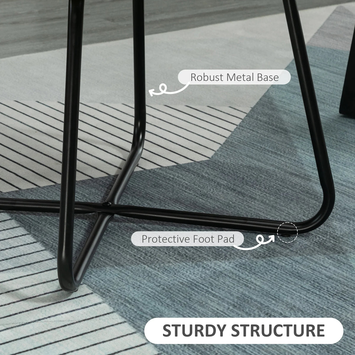 Black metal base of green arm chair with protective foot pads