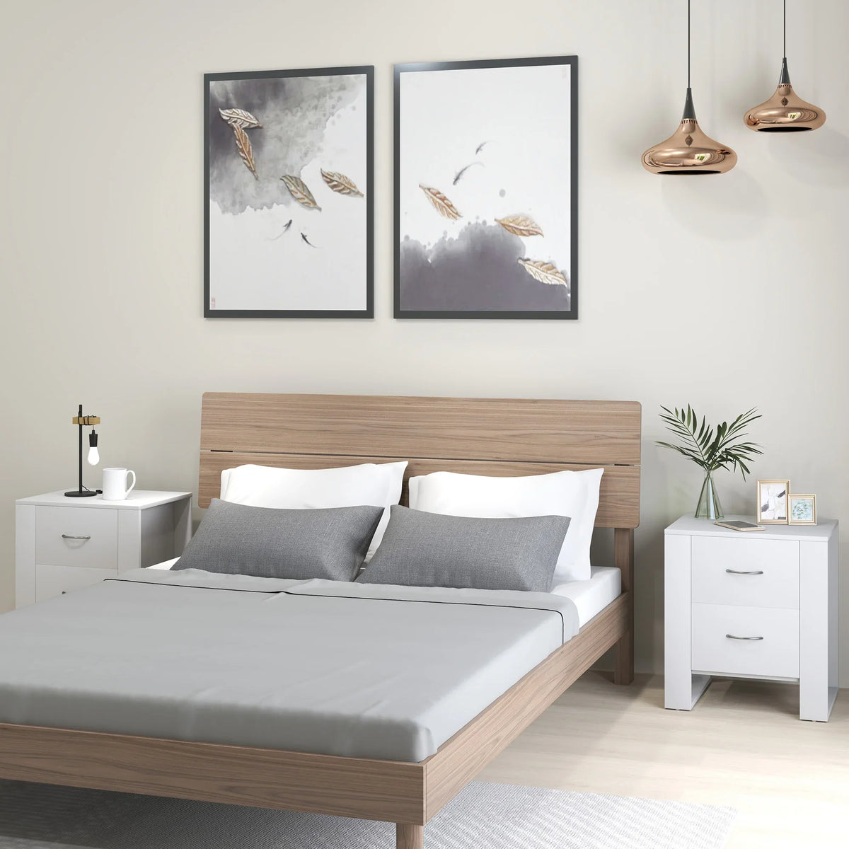 White bedside table with 2 drawers and curved metal handles, shown beside a bed