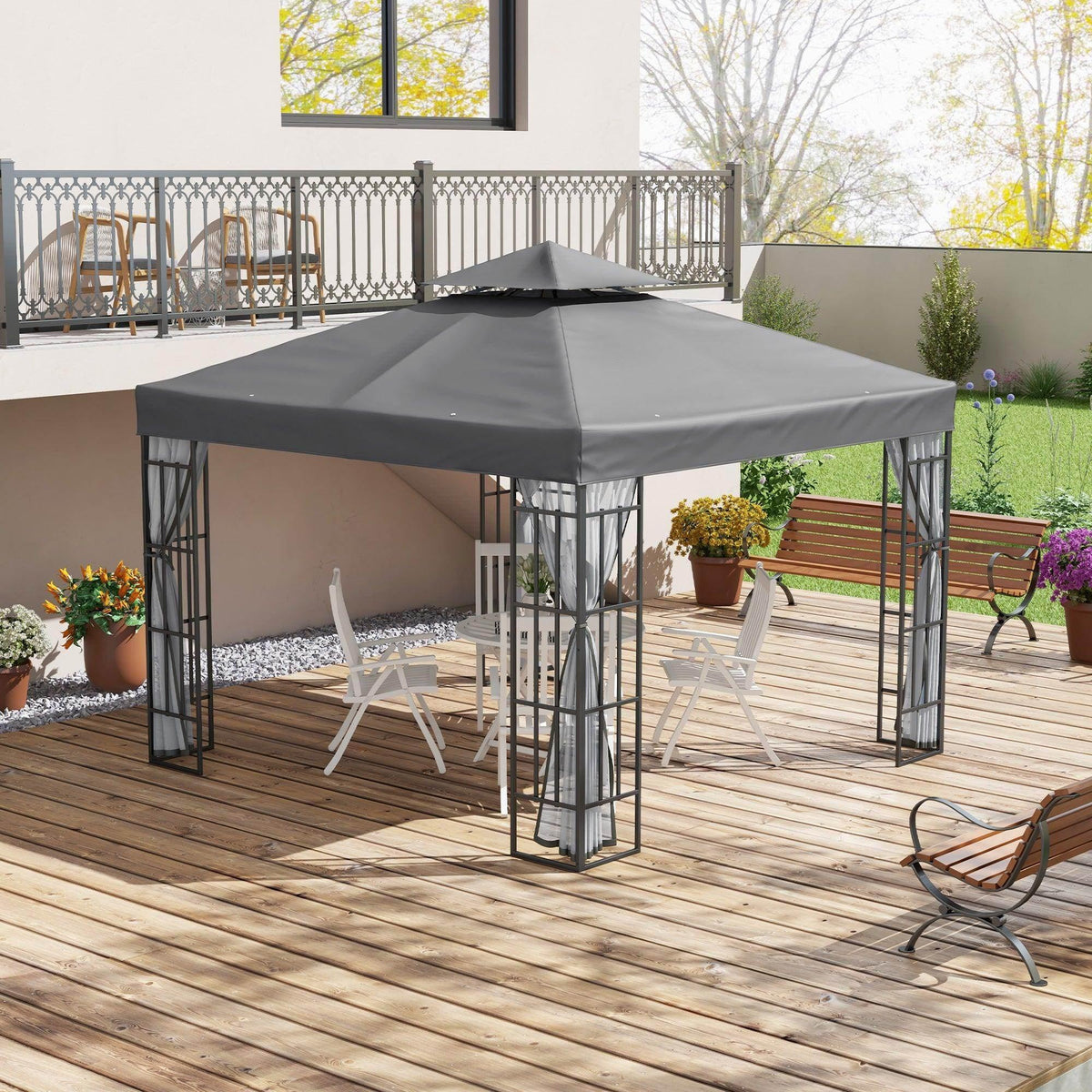 Grey steel-framed patio gazebo with double-tier canopy and mesh mosquito netting