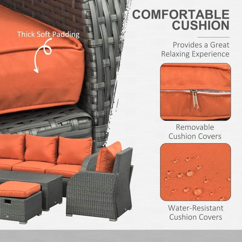 Thick orange seat cushion with removable cover on gray wicker patio chair, textured armrest