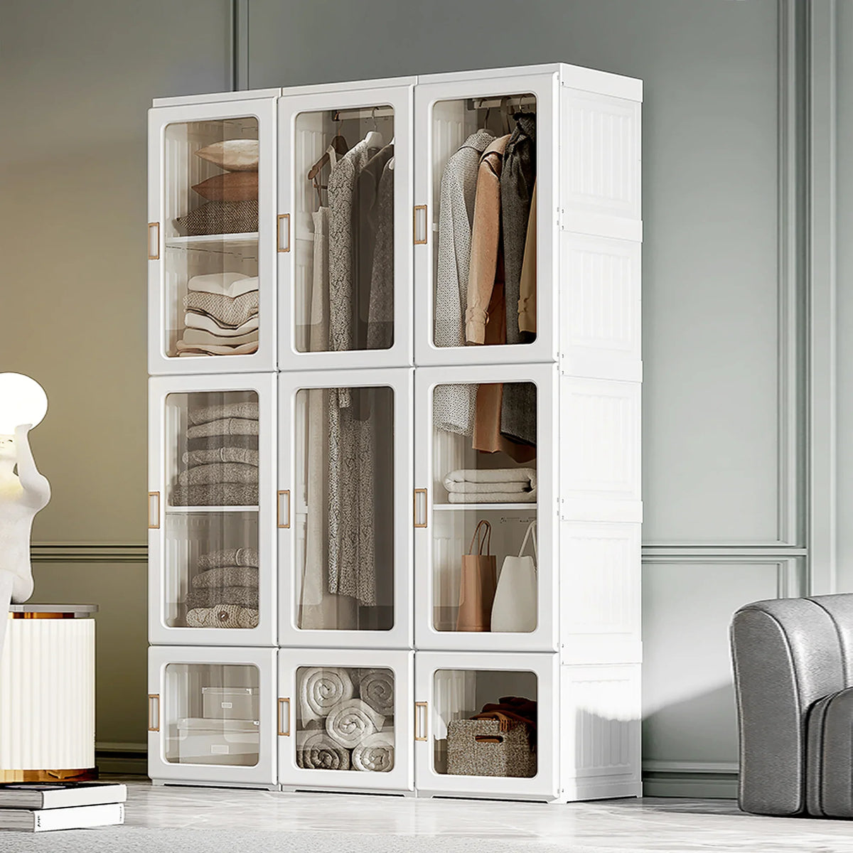 White foldable wardrobe with hinged doors, open cubes, and hanging clothes inside.