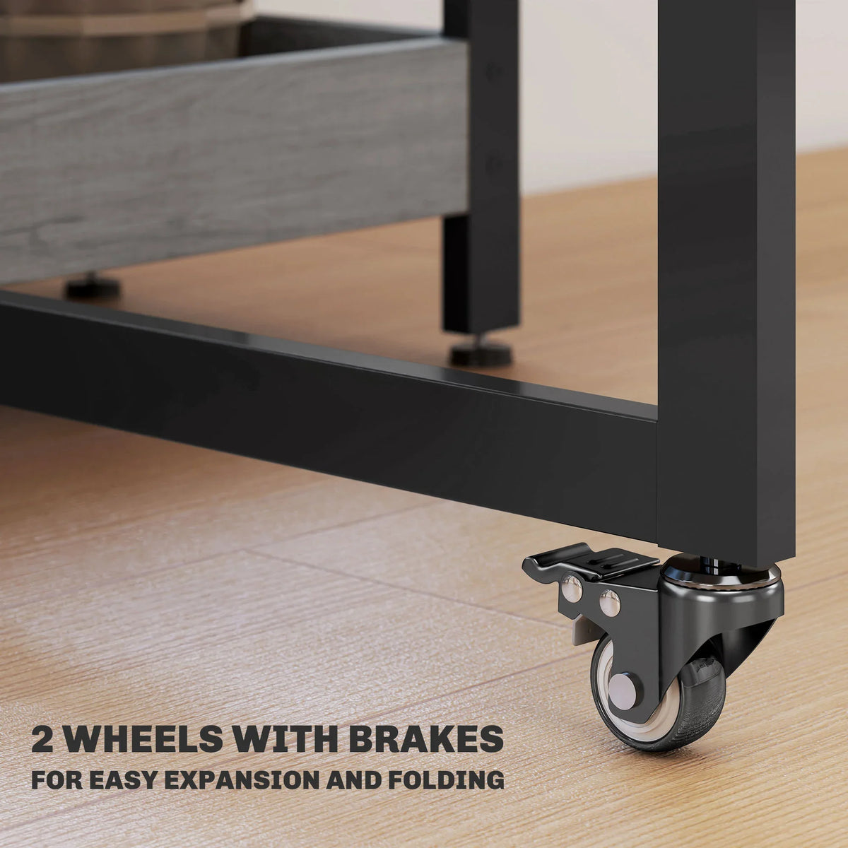 Caster wheel with brake on the base of a grey drop-leaf dining table