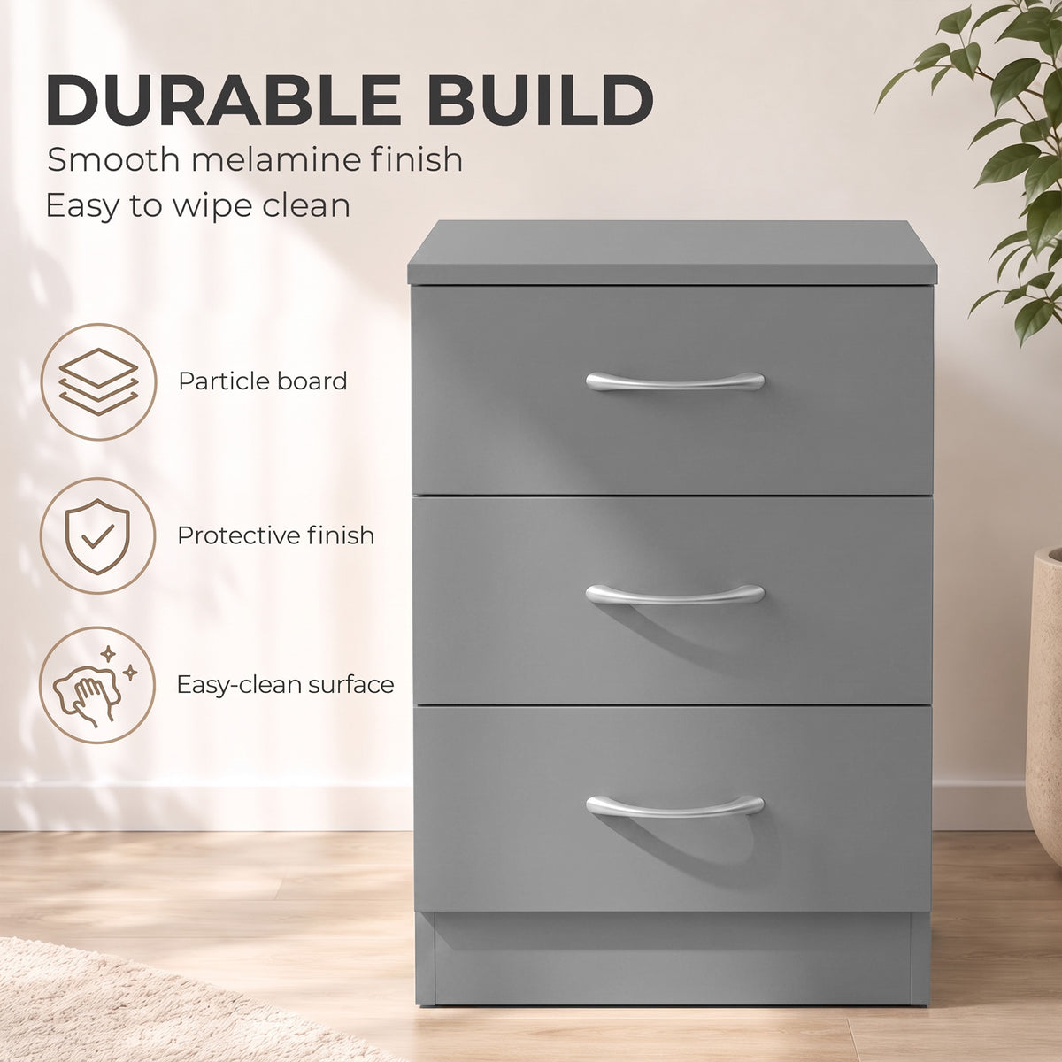 Grey three-drawer nightstand with smooth melamine finish and curved metal handles.