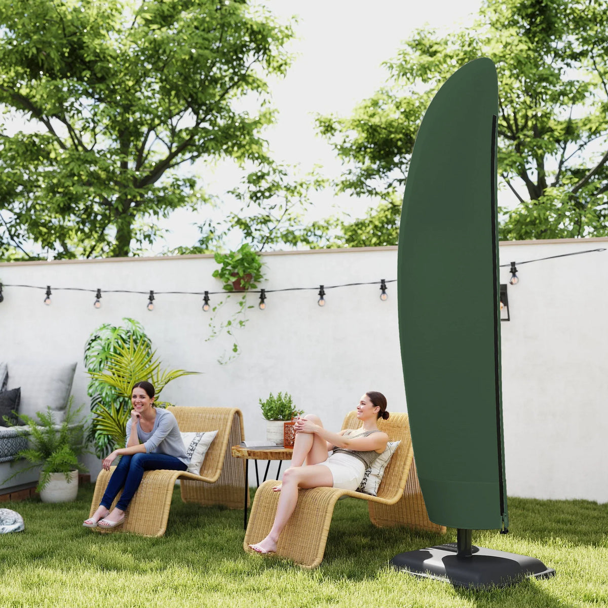 Dark green cantilever umbrella cover standing over base, weatherproof fabric
