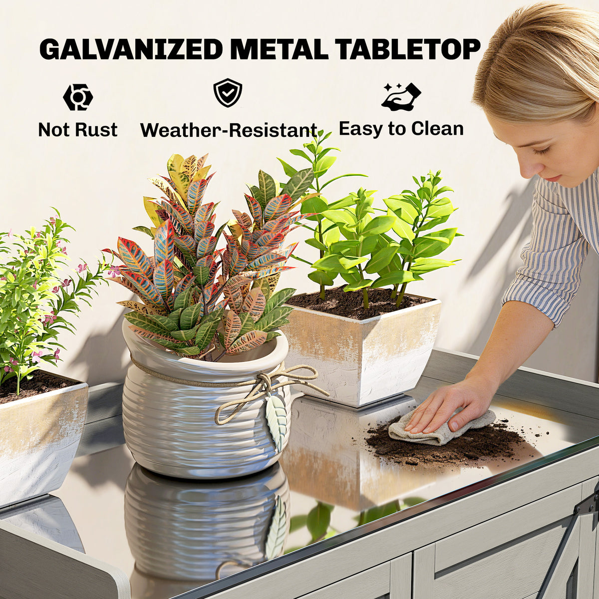 Galvanized metal tabletop on grey garden shed with potted plants and hands working soil.