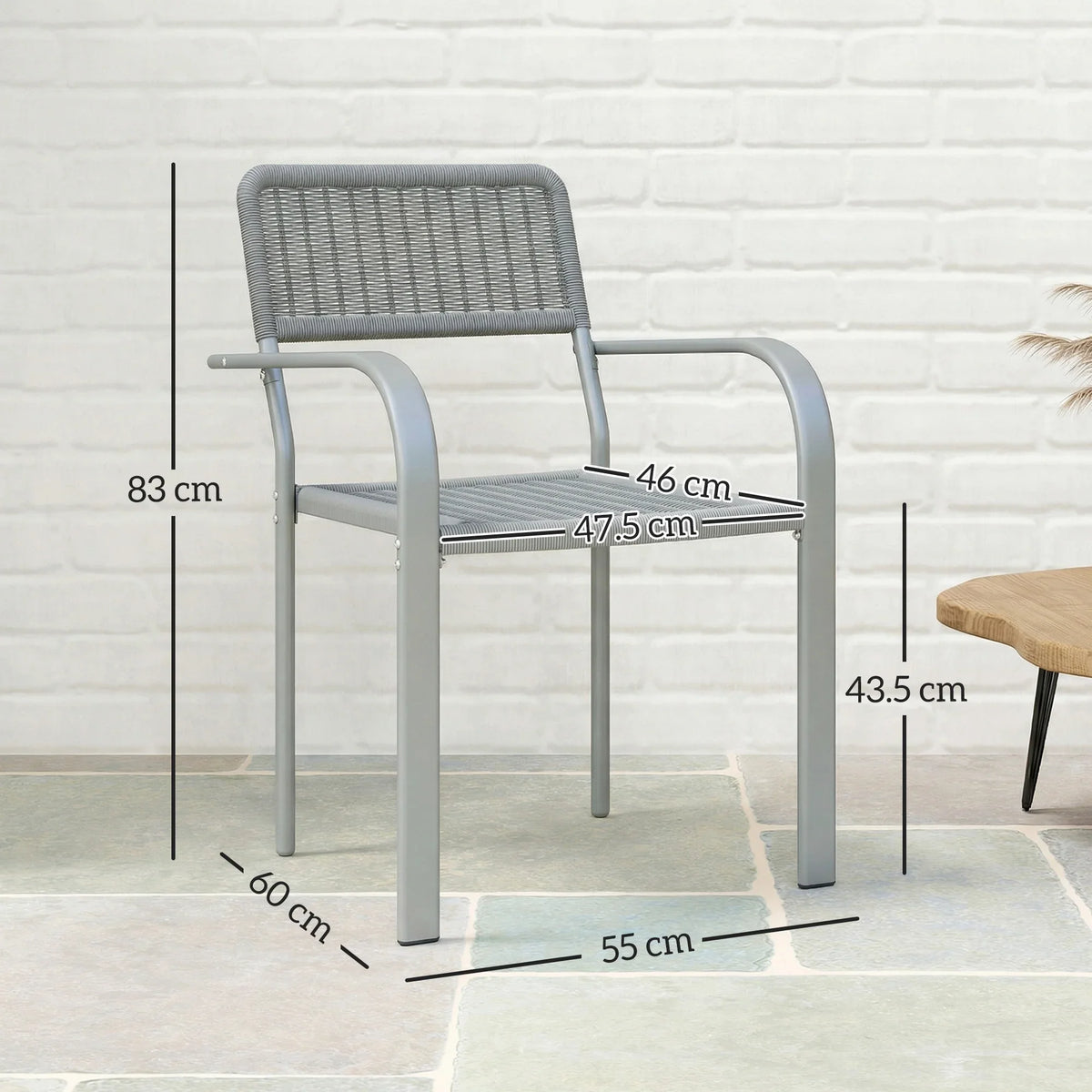 Light grey rattan-effect outdoor dining chair with armrests and curved legs.