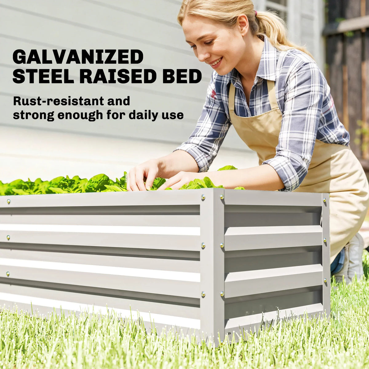 Galvanized steel raised garden bed with tiered panels, used for daily plant care