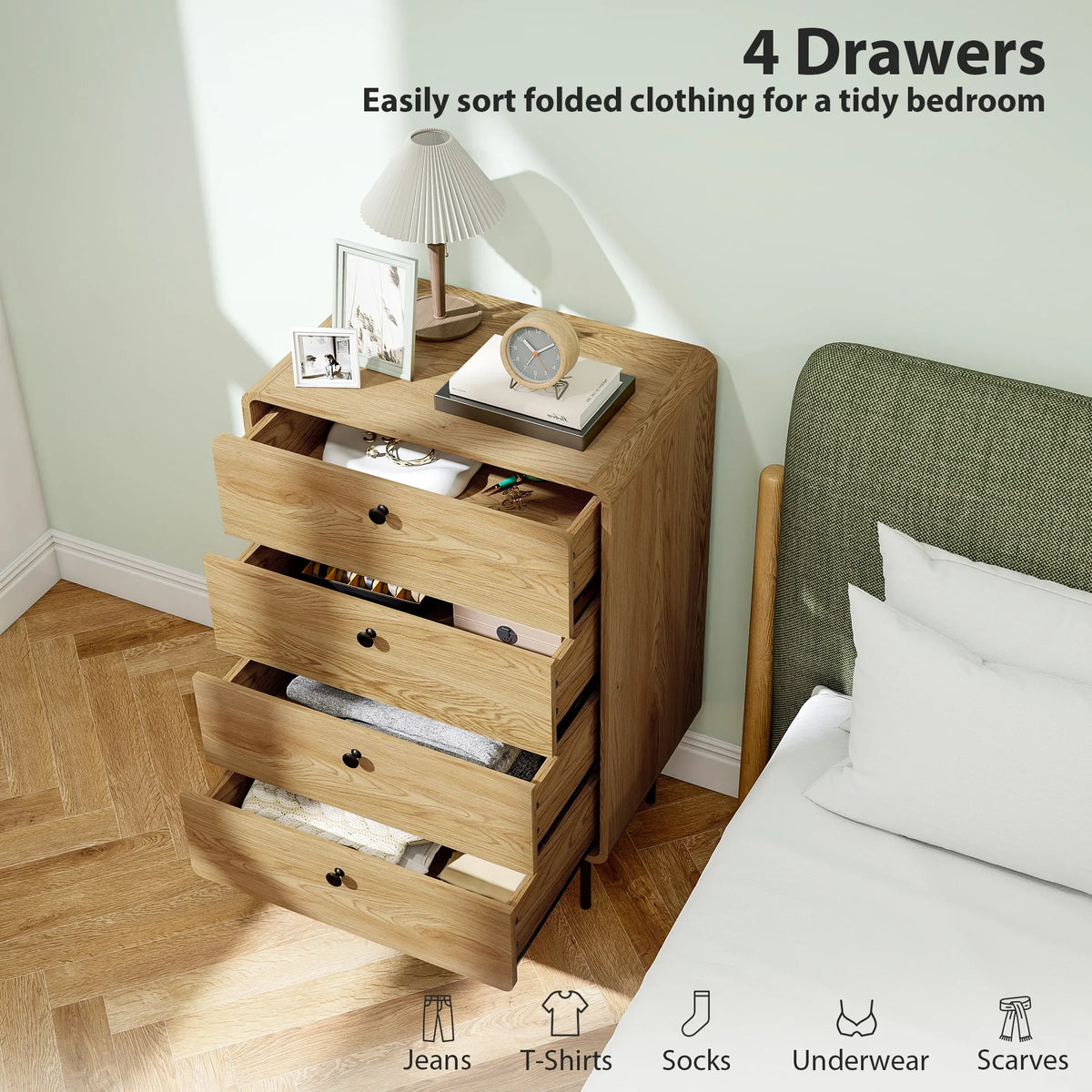 Oak 4-drawer chest with black legs and knob handles; drawers open for storage.