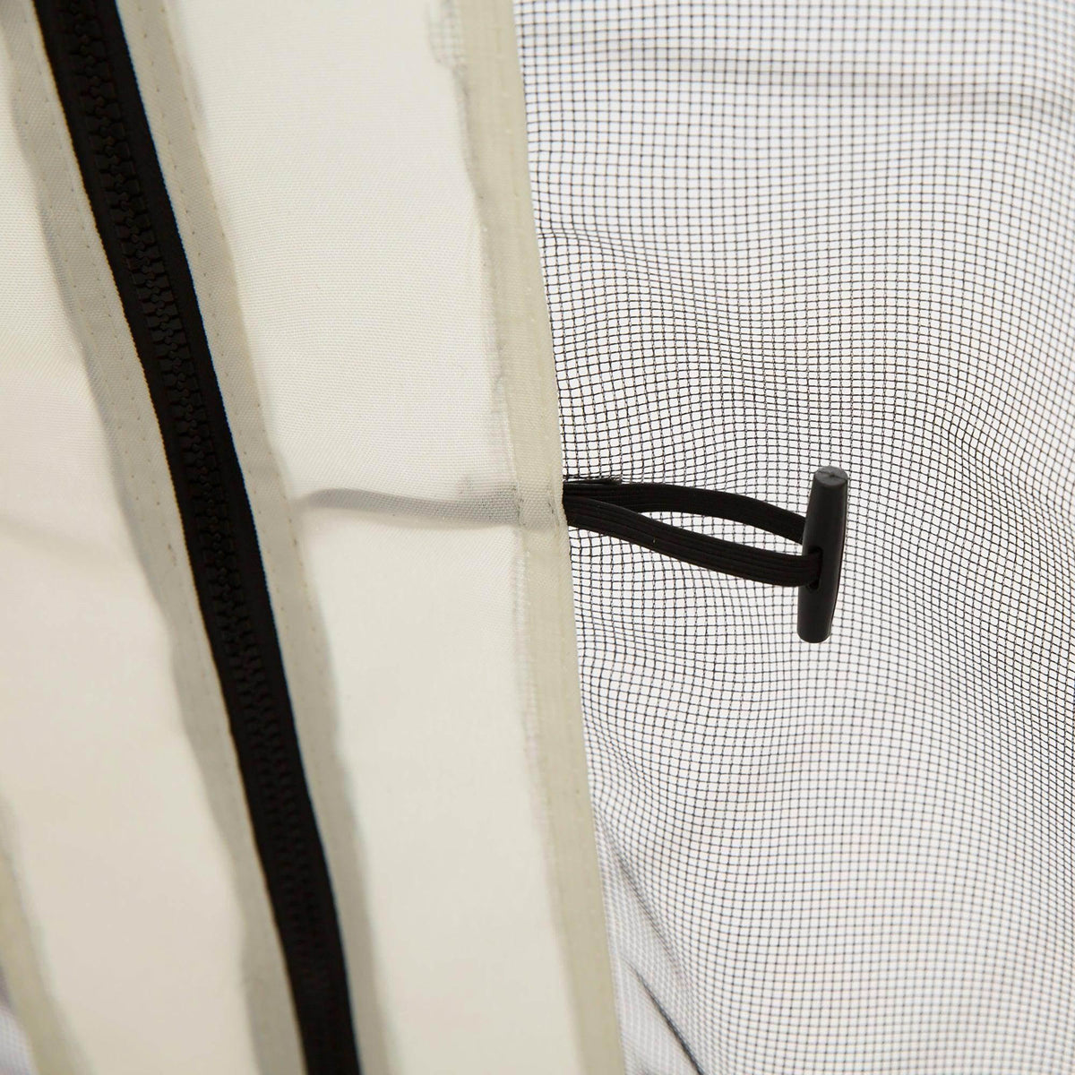 Mesh gazebo side netting with black zipper track and white edge trim, close-up