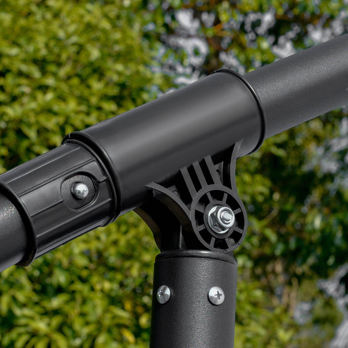 Cantilever umbrella crank handle and adjustment joint on dark support pole
