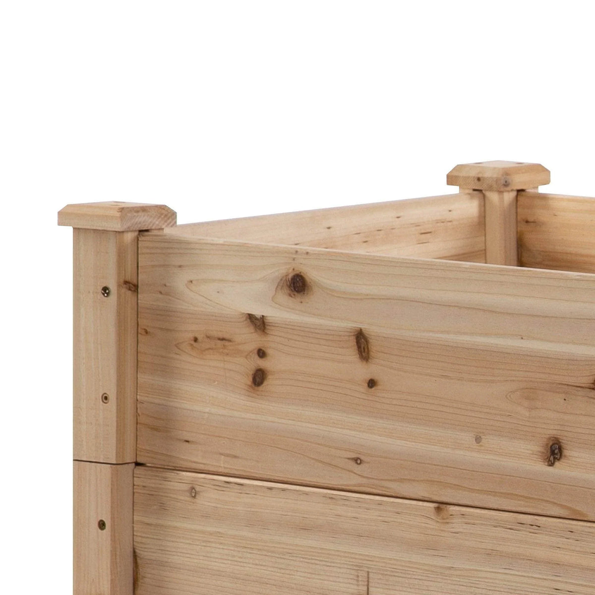 Wooden raised garden bed corner with vertical posts and smooth top rail
