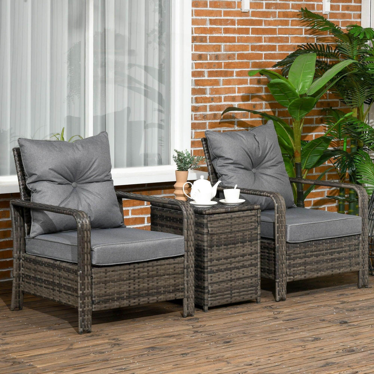 Grey rattan patio armchairs with padded cushions and dark metal frame, compact set