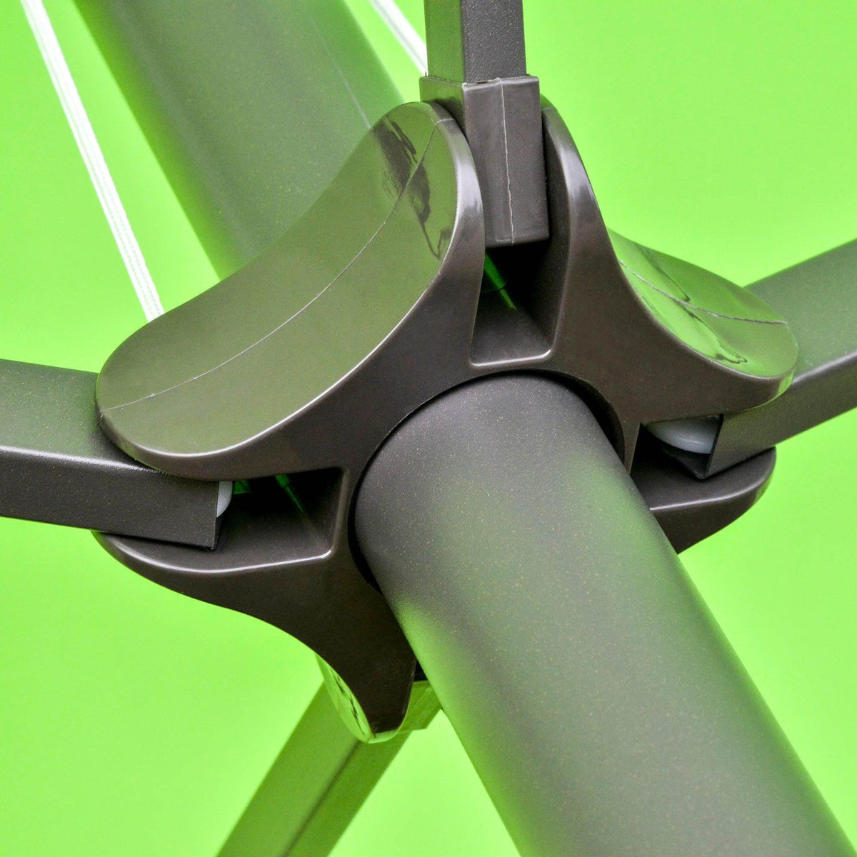 Close-up of umbrella pole joint and canopy ribs with dark grey hardware
