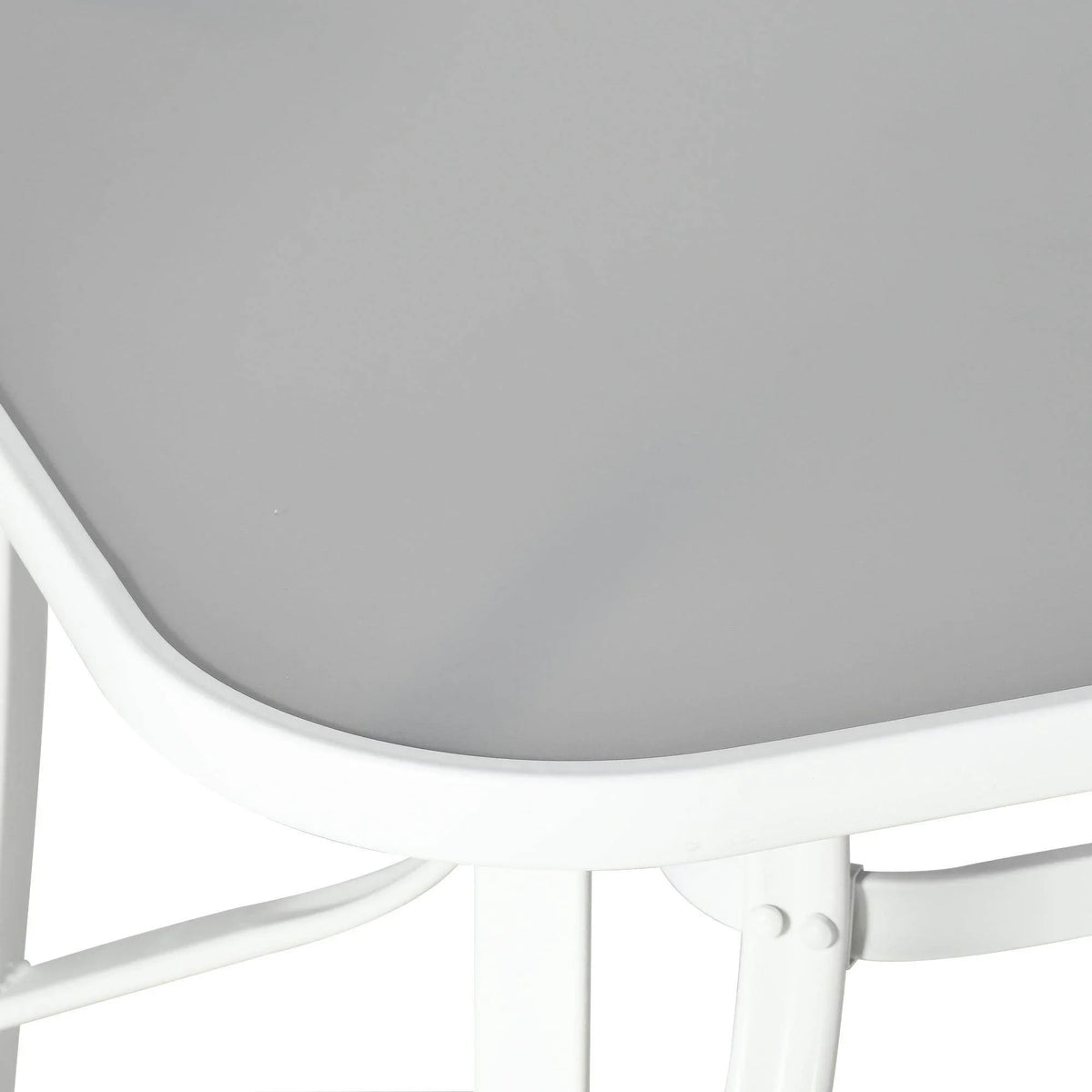 White patio table with curved edge and tempered glass tabletop