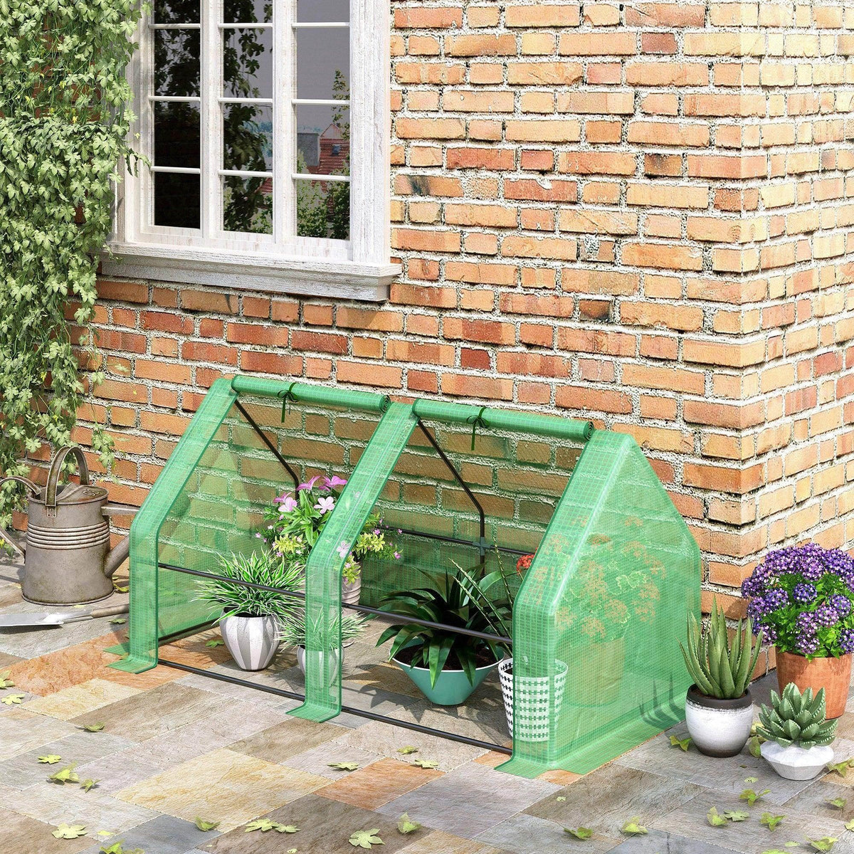 Compact green mesh greenhouse with open side panels and plants inside
