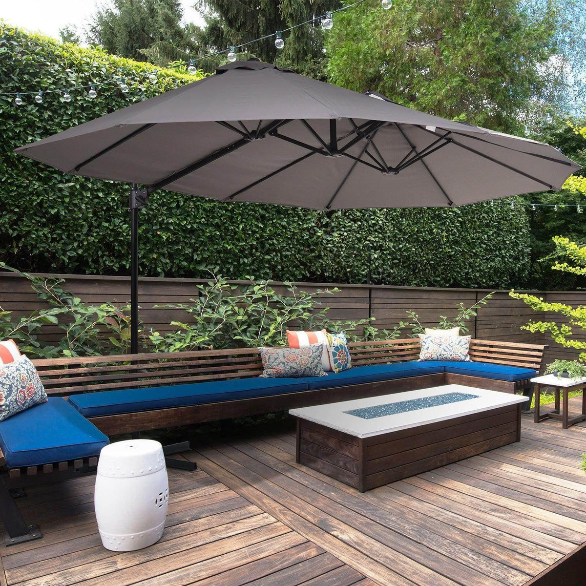 Grey double patio parasol umbrella with open canopy and steel rib frame