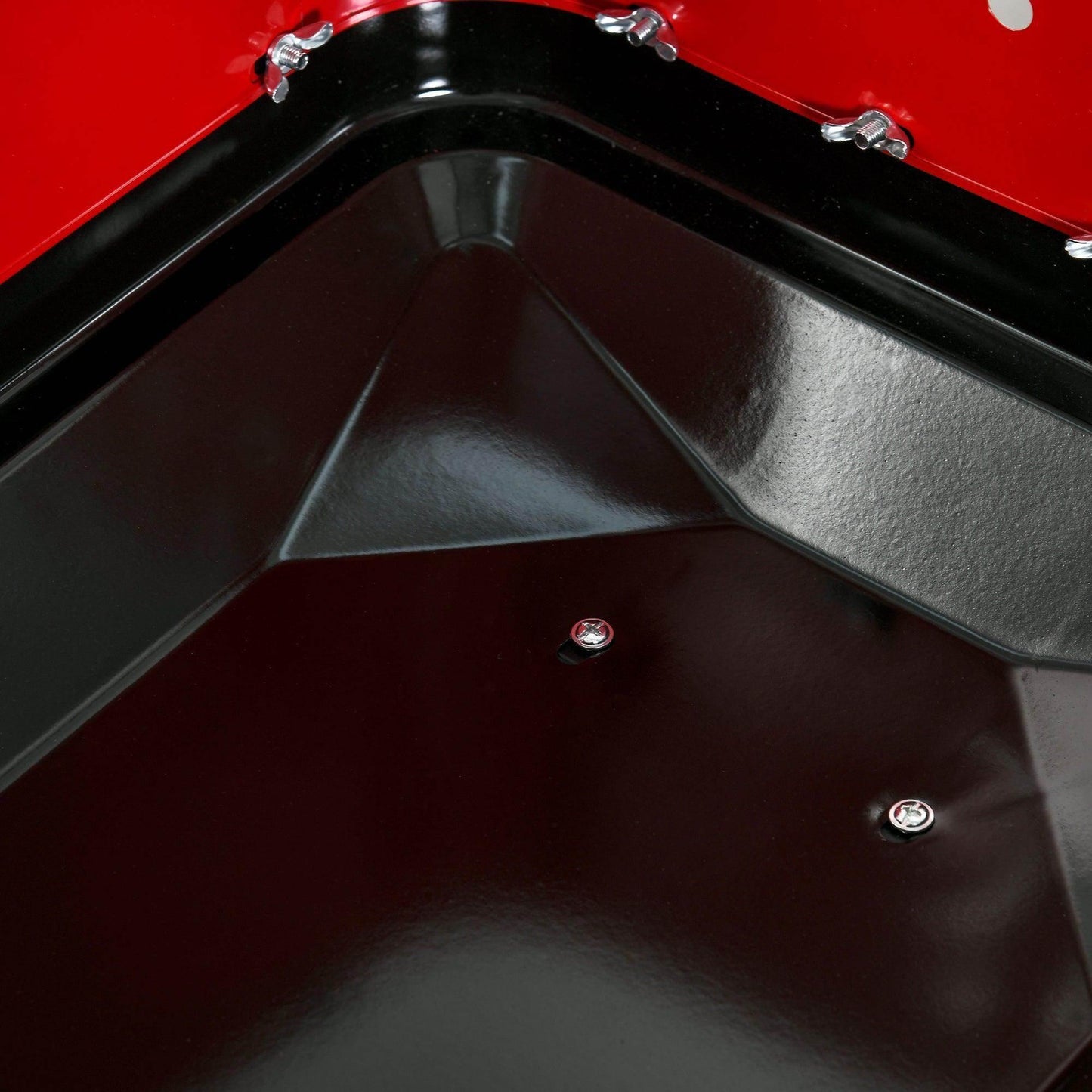 Close-up of black and red Outsunny garden BBQ trolley base with windshield and screws