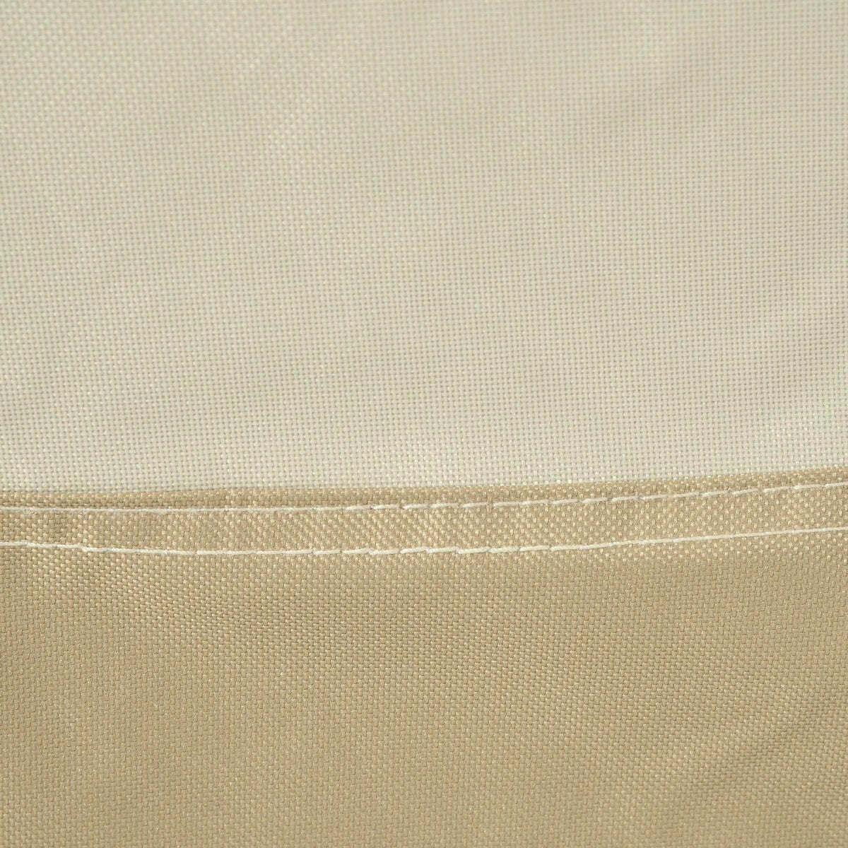 Beige woven garden furniture cover close-up with visible seam and stitching