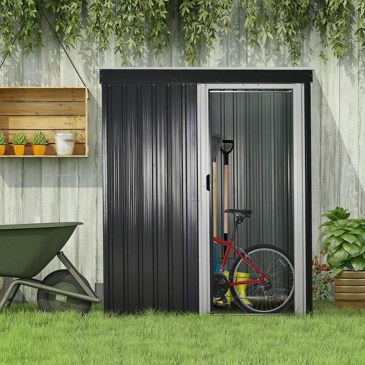 Black metal garden storage shed with sliding door and sloped roof