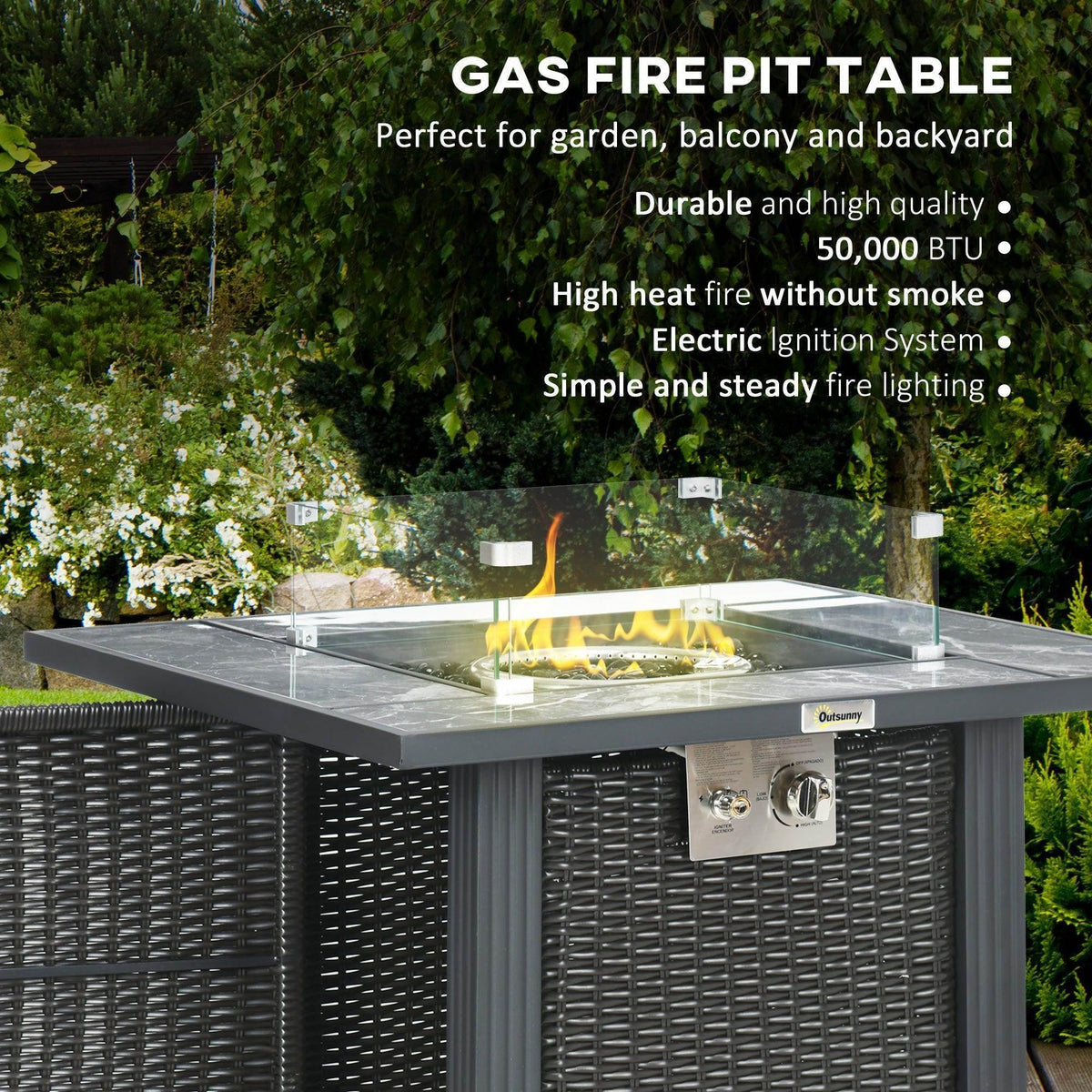 Gas fire pit table with clear glass fire bowl and visible flames on marble-style tabletop