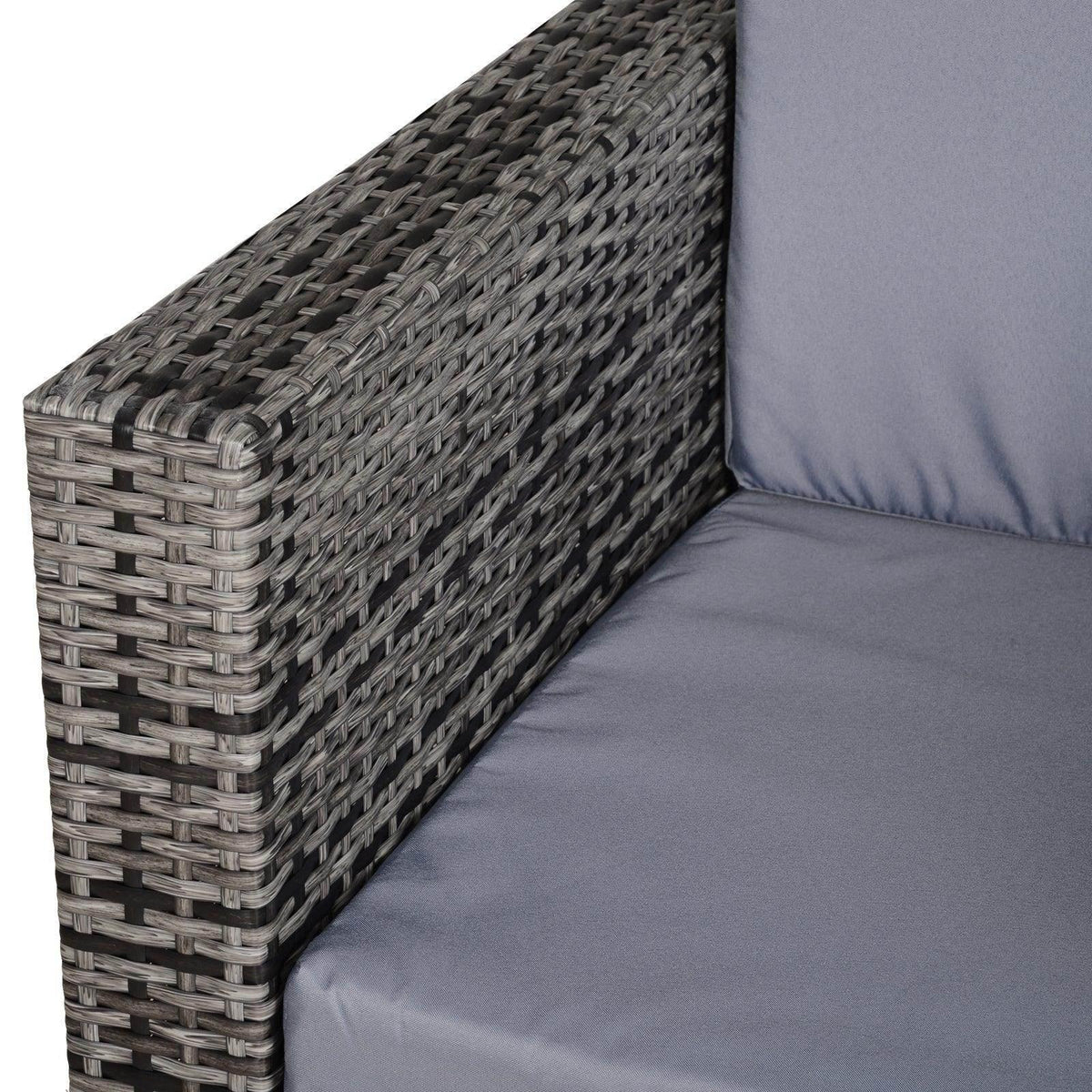 Grey rattan armchair arm and corner with gray seat cushion