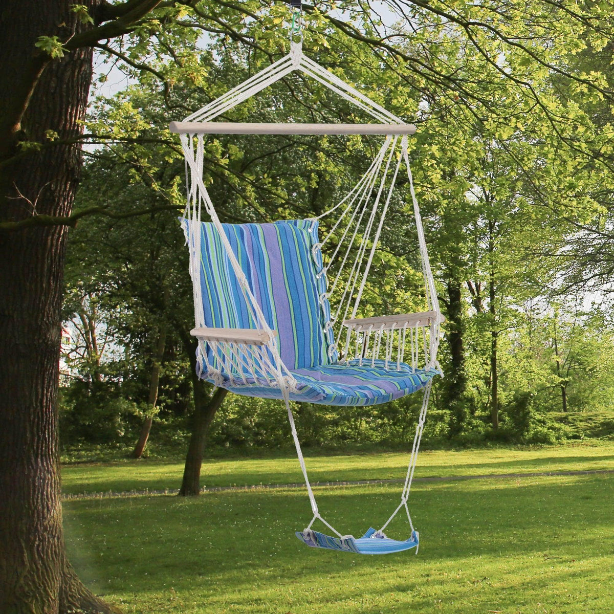 Blue striped hanging rope chair swing with footrest and wooden seat bars