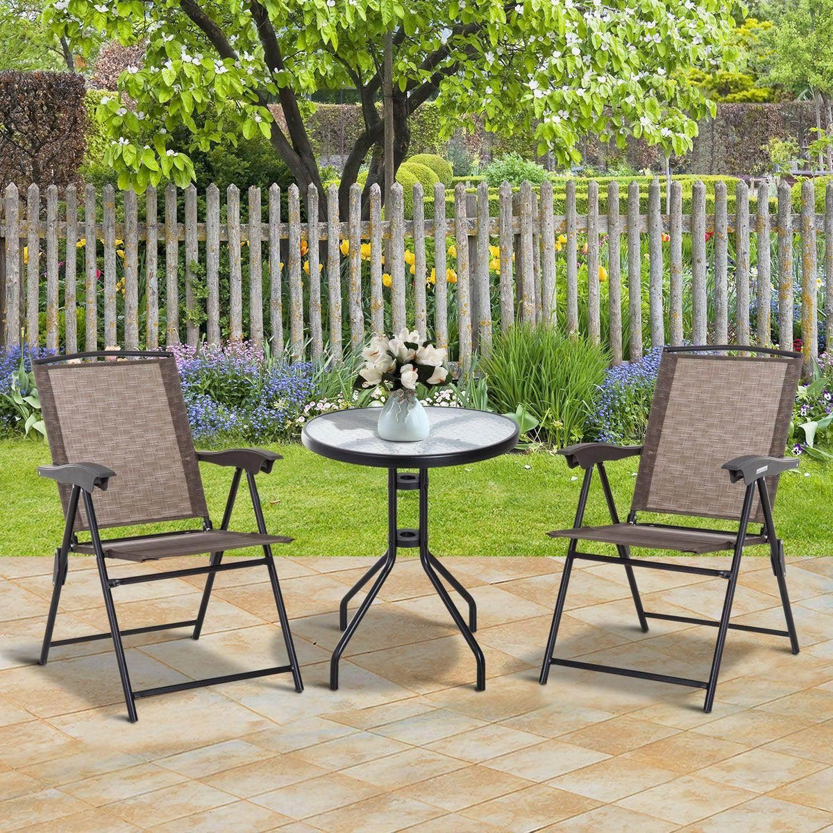Outdoor bistro set: two beige folding chairs and a round black glass table