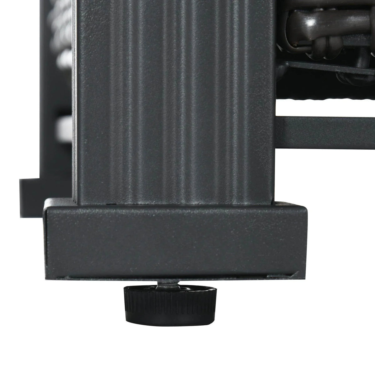 Gas fire pit table close-up of black frame and lower access door area