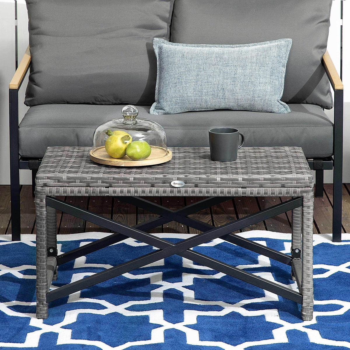 Square gray woven coffee table with black metal cross braces and sturdy legs