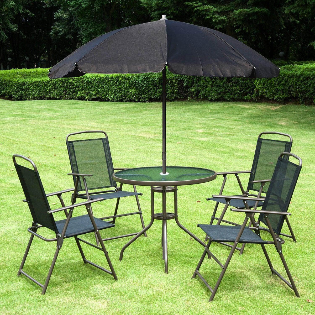 Patio bistro set with dark folding chairs, round table, and black umbrella