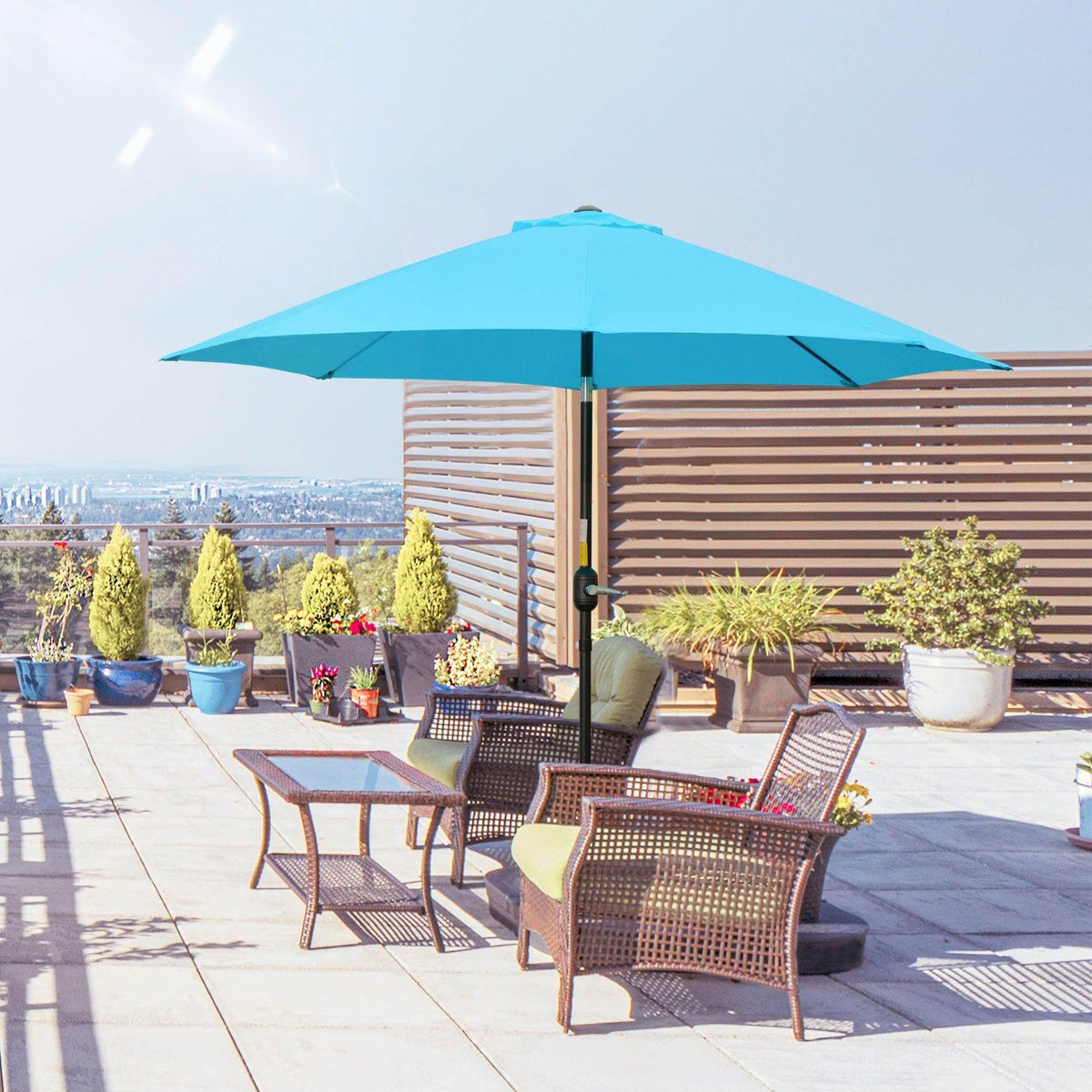 Blue patio tilt umbrella with canopy, crank pole, and rib supports