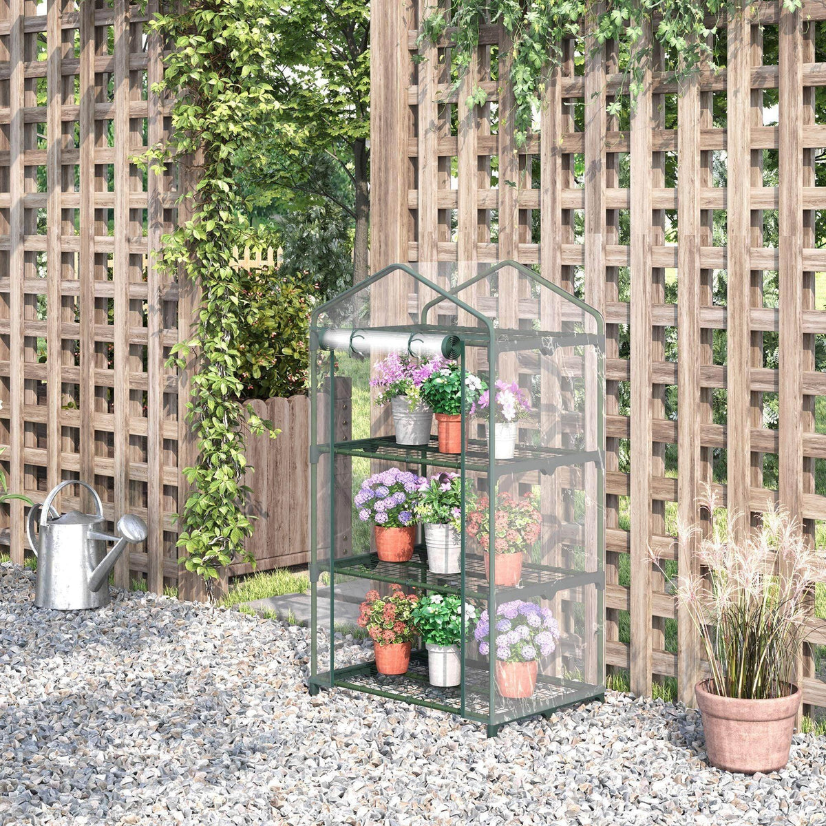 Portable 3-tier mini greenhouse with roll-up door, clear PVC cover and green frame