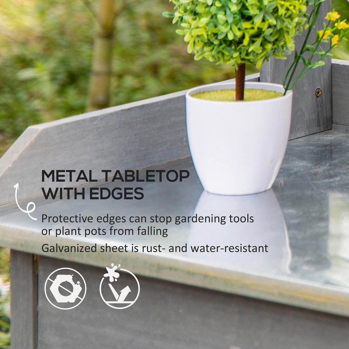 Galvanized metal potting tabletop with protective edges on a gray wooden frame
