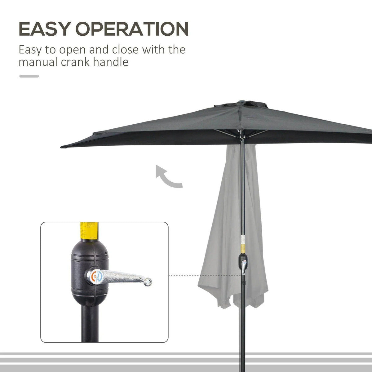 Black patio umbrella with metal pole and manual crank handle, open canopy detail.