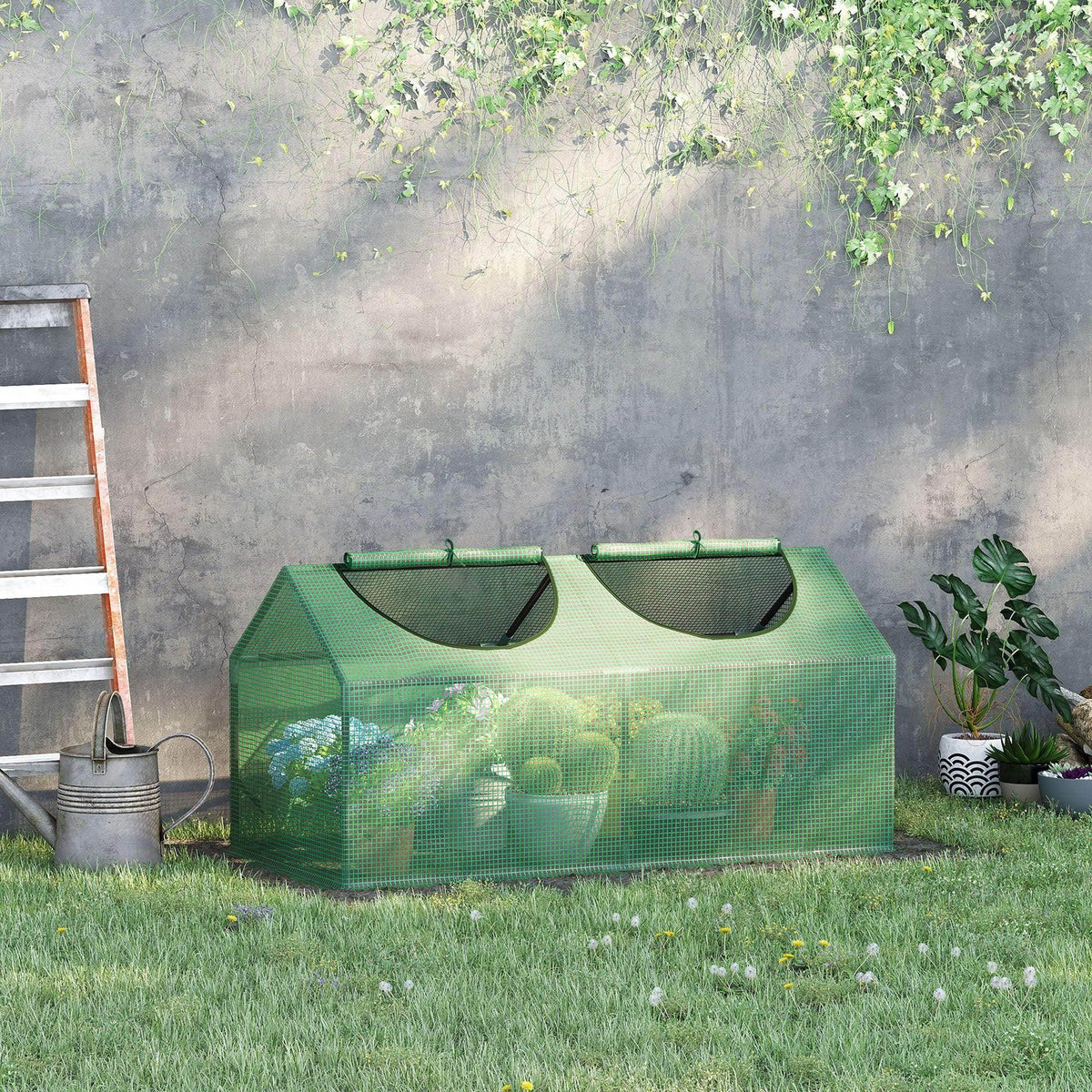 Small green greenhouse tent with dual roll-up front windows and mesh PE cover